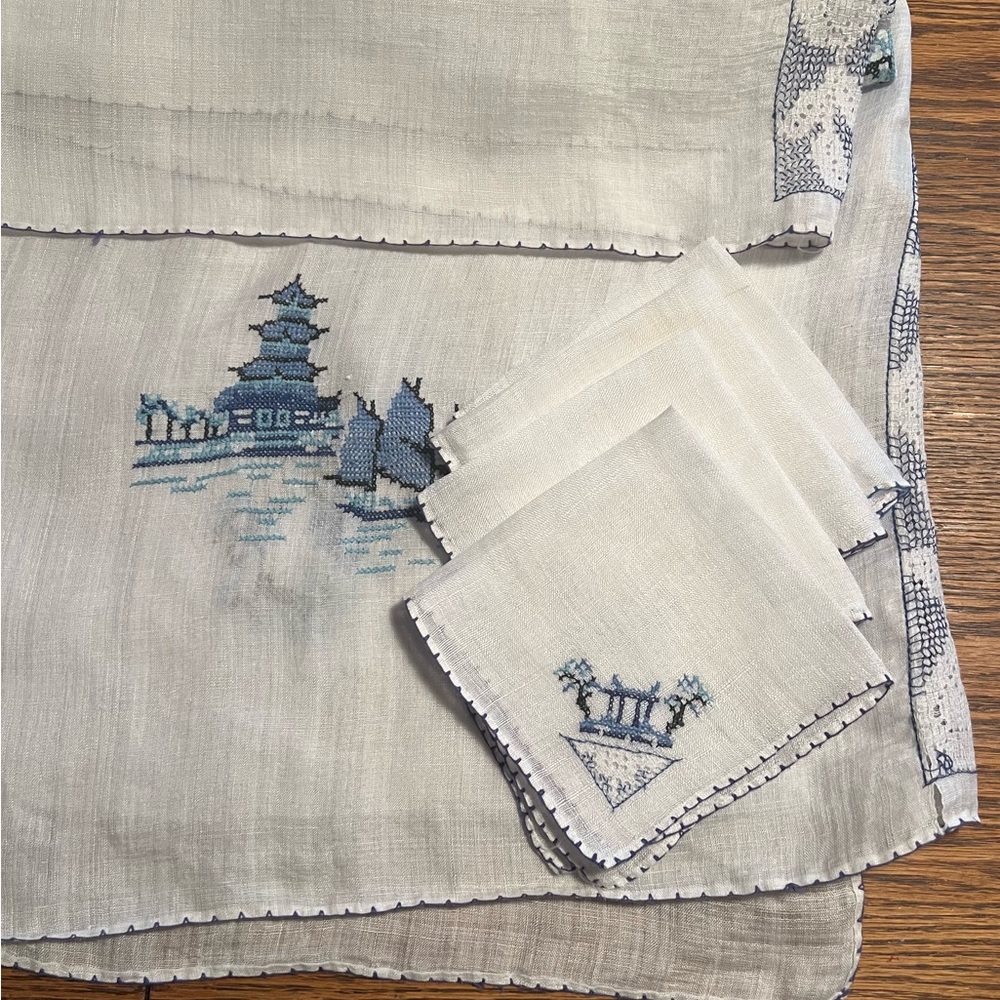 Hand cross stitched tablecloth and 4 napkins